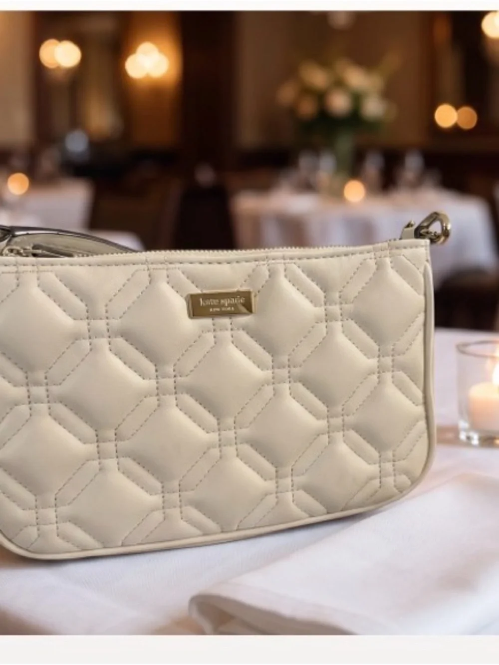 kate spade Cream Quilted Wristlet Clutch with Gold Logo